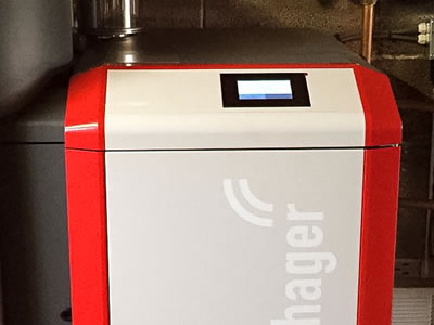 Photo showing close up of Windhager biomass boiler and control panel