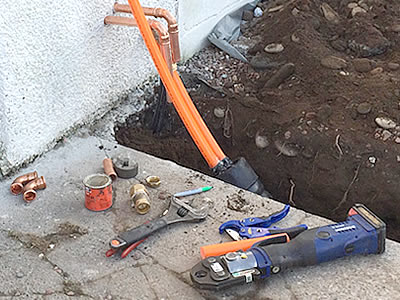 Photo of biomass insulated underground pipework to house